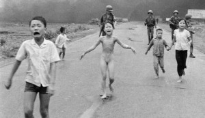 FILE - This is a June 8, 1972 file photo of South Vietnamese forces follow after terrified children, including 9-year-old Kim Phuc, center, as they run down Route 1 near Trang Bang after an aerial napalm attack on suspected Viet Cong hiding places . Norway's Prime Minister Erna Solberg on Friday Sept. 9, 2016 challenged Facebook’s restrictions on nude photos by posting an iconic 1972 image of a naked girl running from an aerial napalm attack in Vietnam. The Pulitzer Prize-winning image by Associated Press photographer Nick Ut is at the center of a heated debate about freedom of speech in Norway after Facebook deleted it from a Norwegian author’s page last month. (AP Photo/Nick Ut, File)