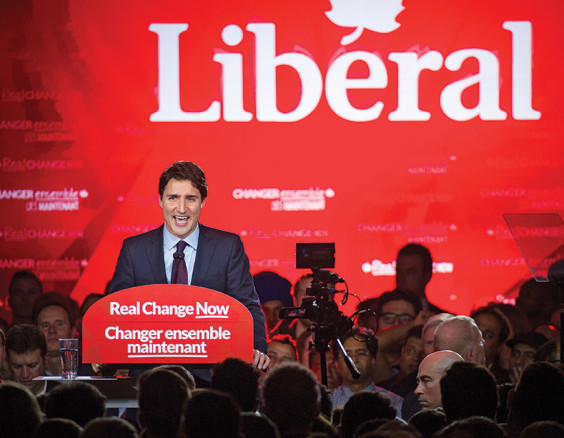 Justin Trudeau, Canada's prime minister-elect and leader of the Liberal Party of Canada, speaks to supporters on election night in Montreal, Quebec, Canada, on Tuesday, Oct. 20, 2015. Trudeau's Liberal Party swept into office with a surprise majority, ousting Prime Minister Stephen Harper and capping the biggest comeback election victory in Canadian history. (Kevin Van Paassen/Bloomberg/Getty Images)