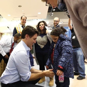 Justin Trudeau welcoming refugees
