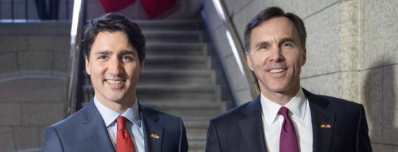 Prime Minister Justin Trudeau (left) walks with Minister of Finance Bill Morneau as he arrives to table the budget on Parliament Hill, Tuesday, March 22, 2016 in Ottawa. THE CANADIAN PRESS/Justin Tang