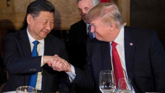 Trump and Xi handshake